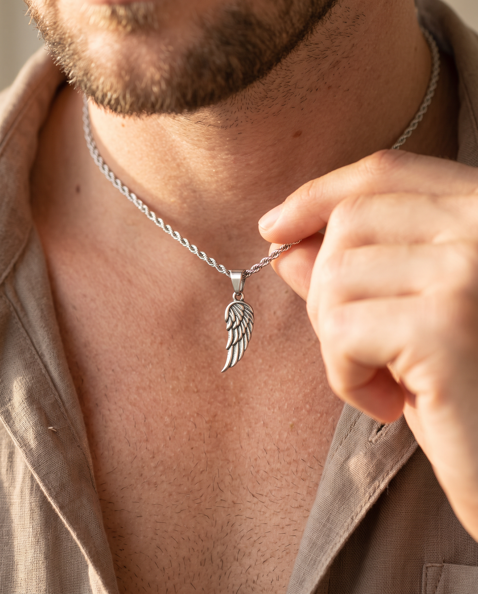 Small Wing Pendant Silver - Worn detail
