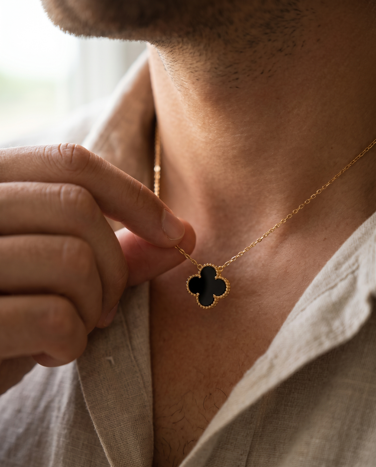 Lucky Charm Black Pendant Gold - Worn detail